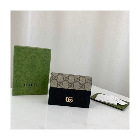 gucci card golder ca|GG Marmont card case wallet in dark gold leather .